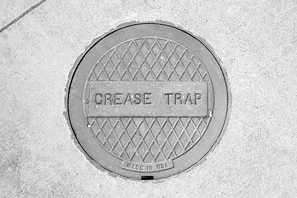 regularly cleaning and maintaining your grease trap can help reduce the frequency of grease trap pumping